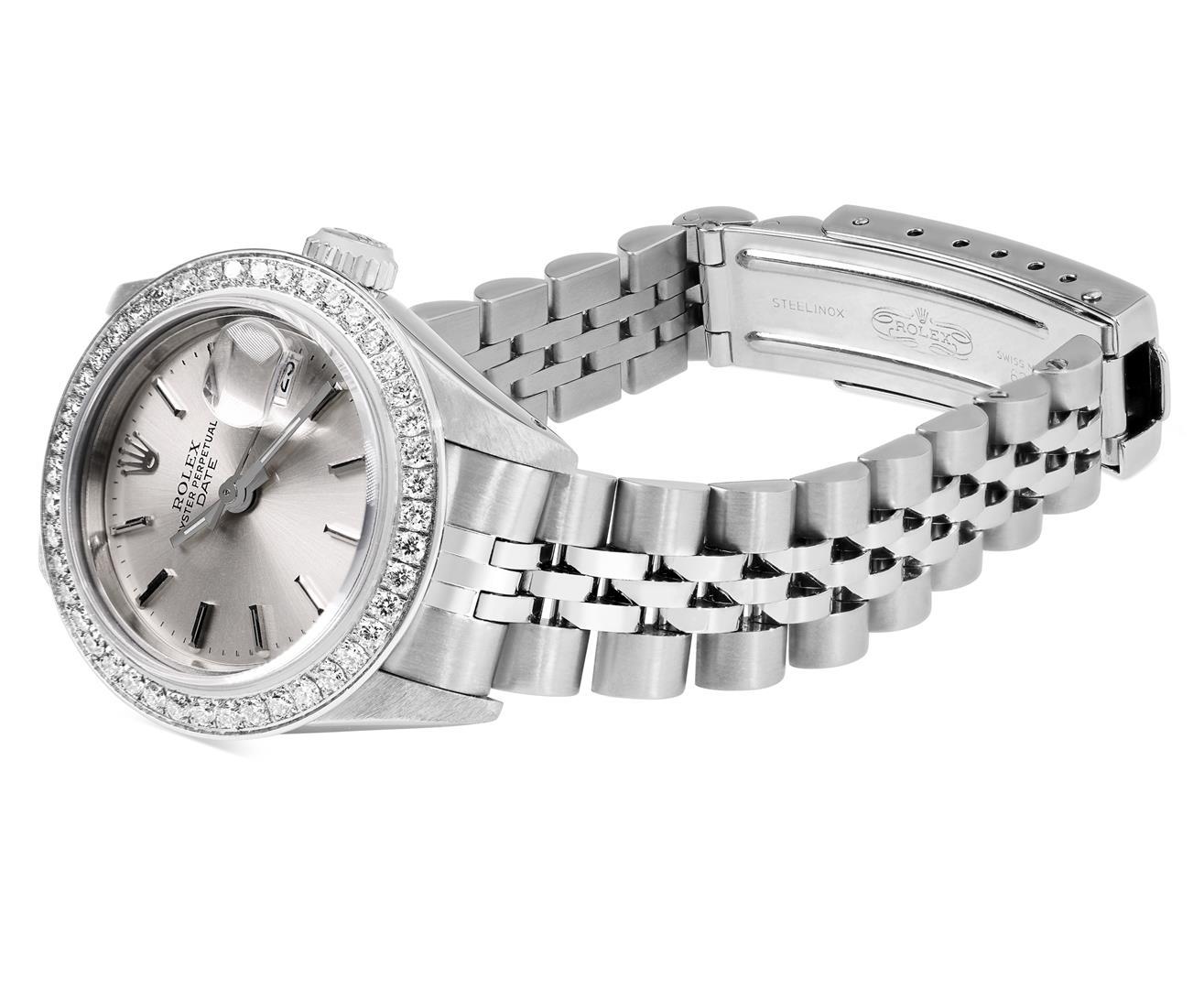 Rolex Ladies Quickset Stainless Steel Silver Index Diamond Bezel Date Watch