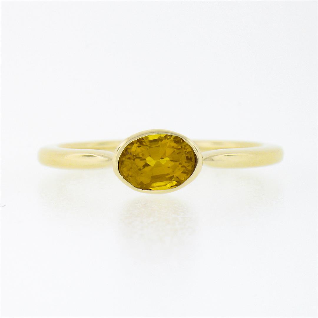 Simple Petite 14k Gold 0.70 ctw Bezel Oval Orange Yellow Sapphire Solitaire Ring