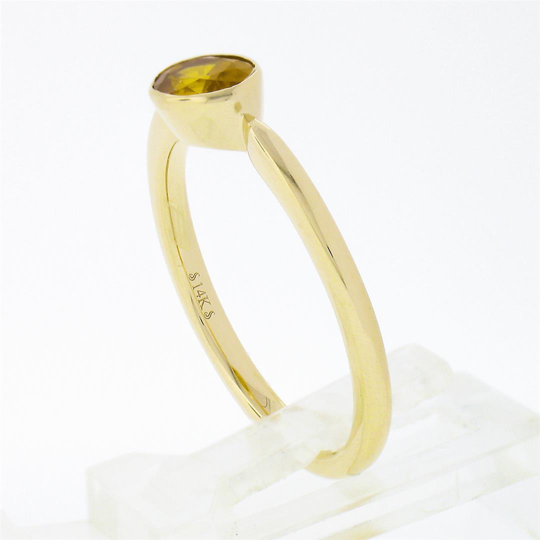 Simple Petite 14k Gold 0.70 ctw Bezel Oval Orange Yellow Sapphire Solitaire Ring