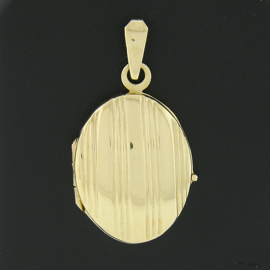 Italian 14k Yellow Gold Polished Grooved Vertical Work Large Oval Locket Pendant