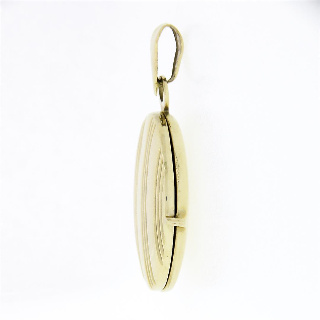 Italian 14k Yellow Gold Polished Grooved Vertical Work Large Oval Locket Pendant