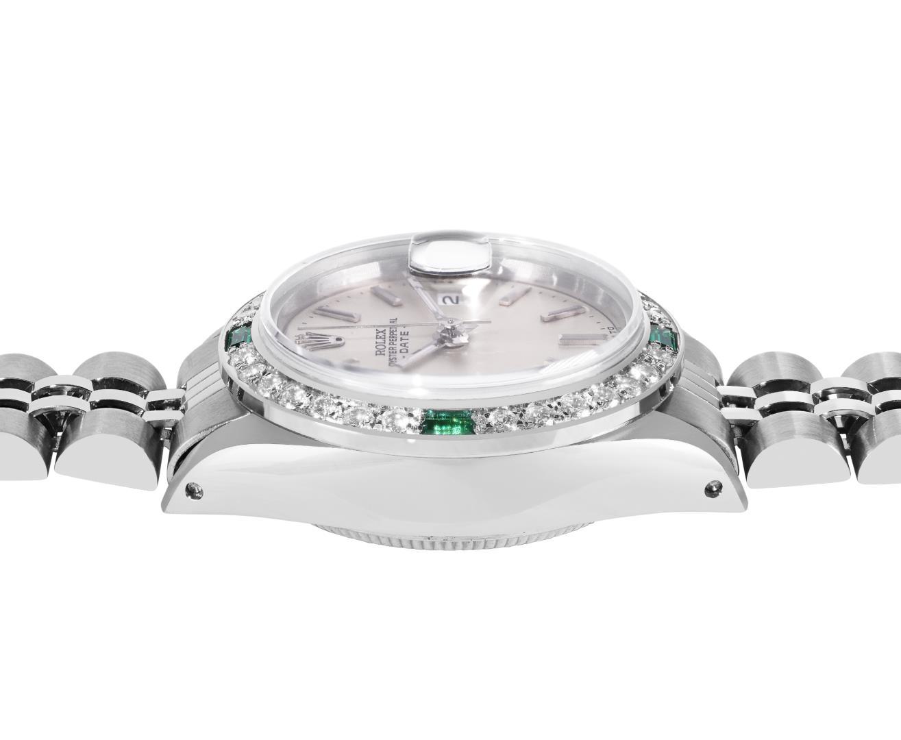 Rolex Ladies Stainless Steel Silver Index Diamond And Emerald Date Watch