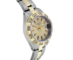 Rolex Ladies Two Tone Gold And Steel Champagne Dial Pyramid Bezel Oyster Band Da