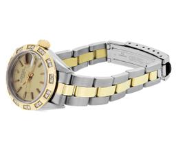 Rolex Ladies Two Tone Gold And Steel Champagne Dial Pyramid Bezel Oyster Band Da