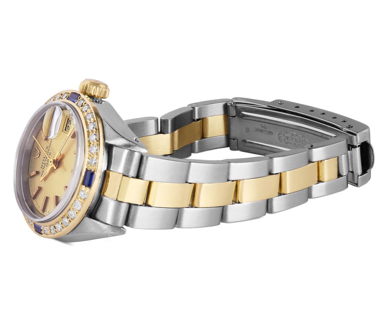 Rolex Ladies Two Tone Gold And Steel Champagne Dial Diamond And Sapphire Date Wa