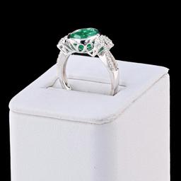 3.12 ctw Emerald and 0.38 ctw Diamond 18K White Gold Ring