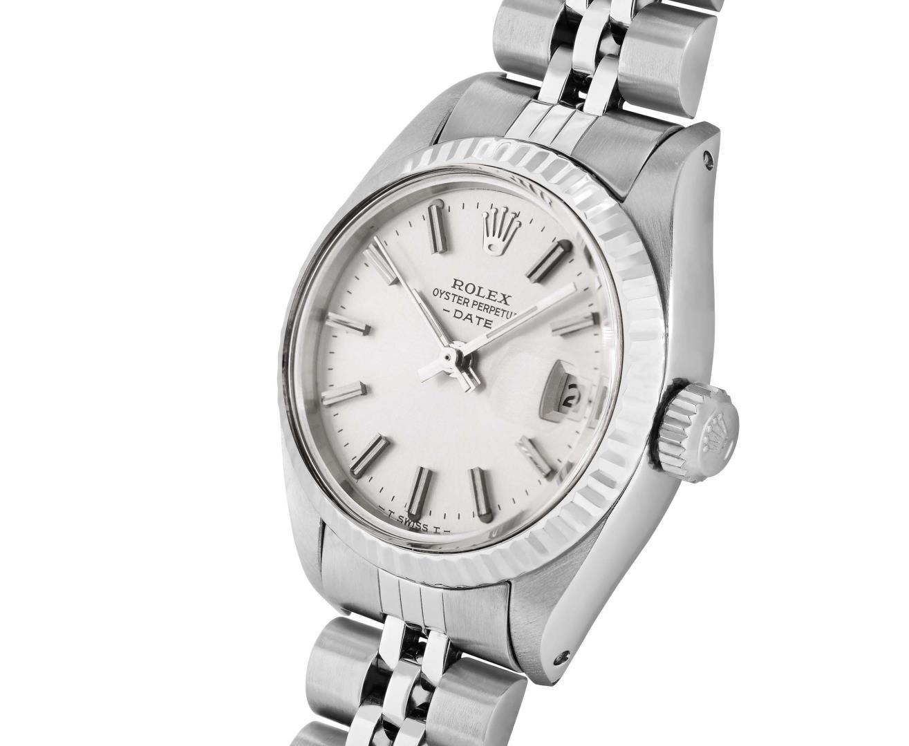 Rolex Ladies Stainless Steel Silver Index Fluted Bezel Date Wristwatch