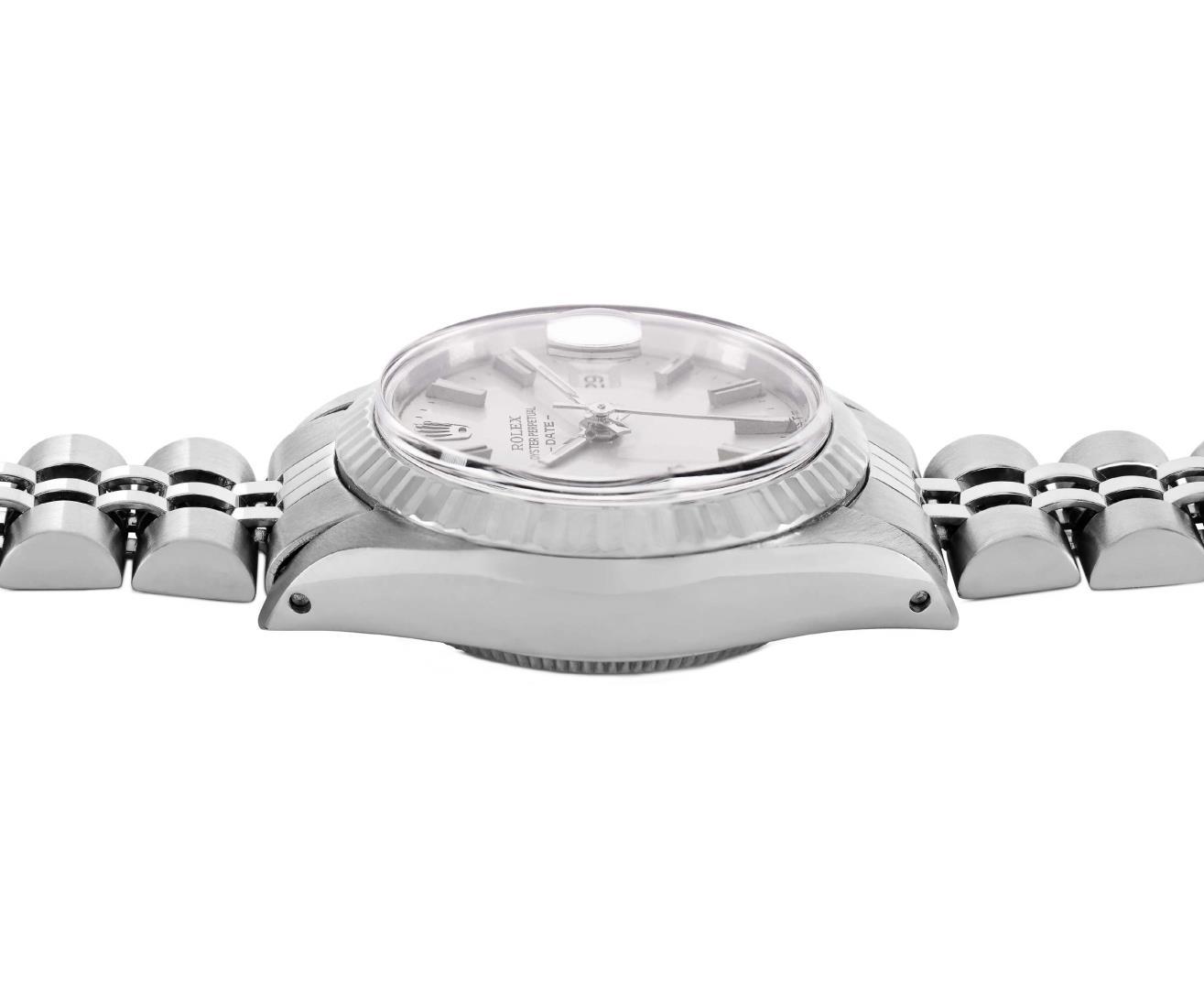 Rolex Ladies Stainless Steel Silver Index Fluted Bezel Date Wristwatch