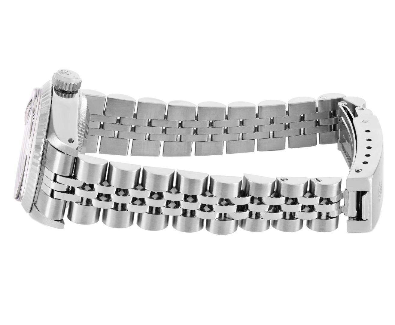 Rolex Ladies Stainless Steel Silver Index Fluted Bezel Date Wristwatch