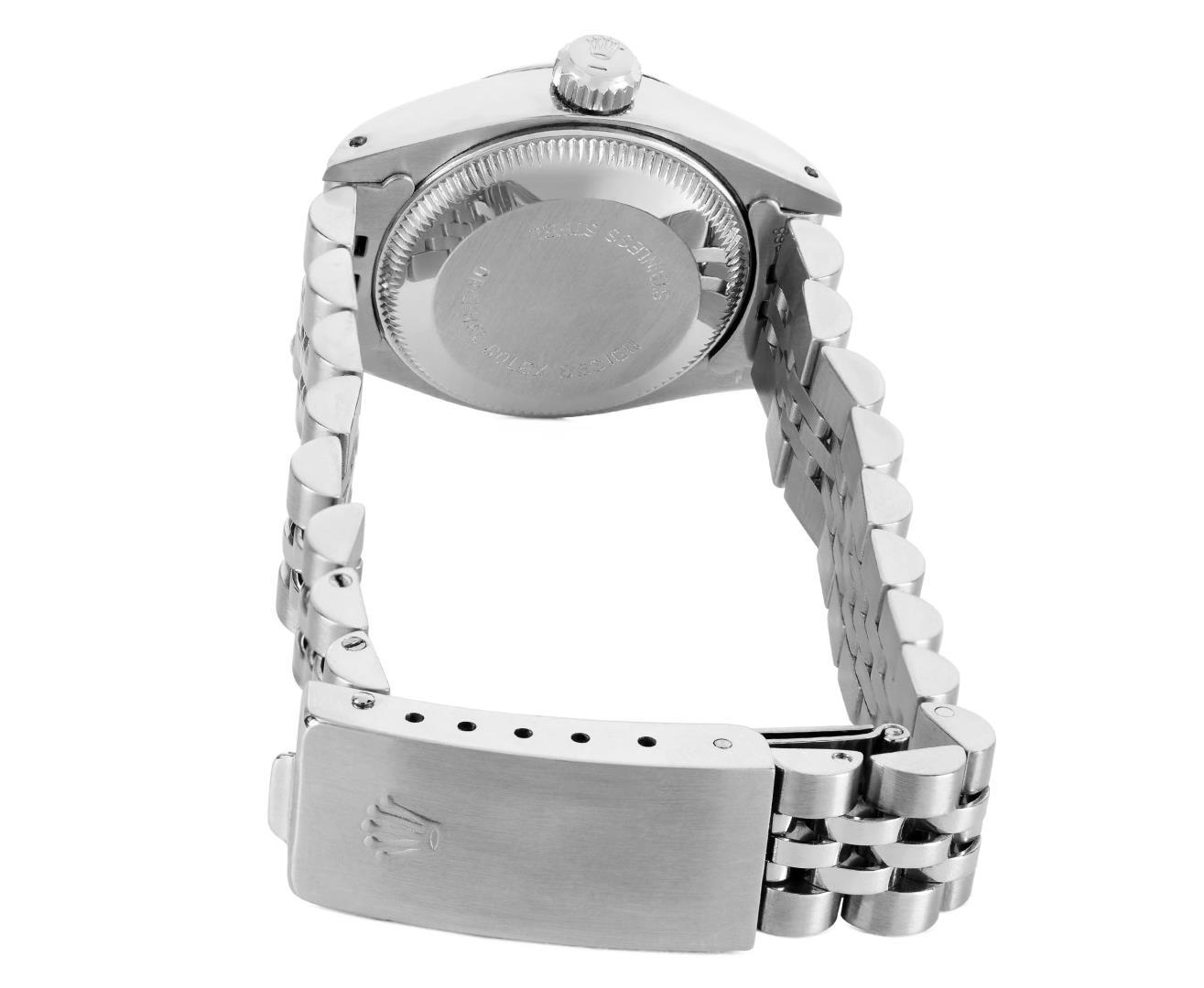 Rolex Ladies Stainless Steel Silver Index Fluted Bezel Date Wristwatch