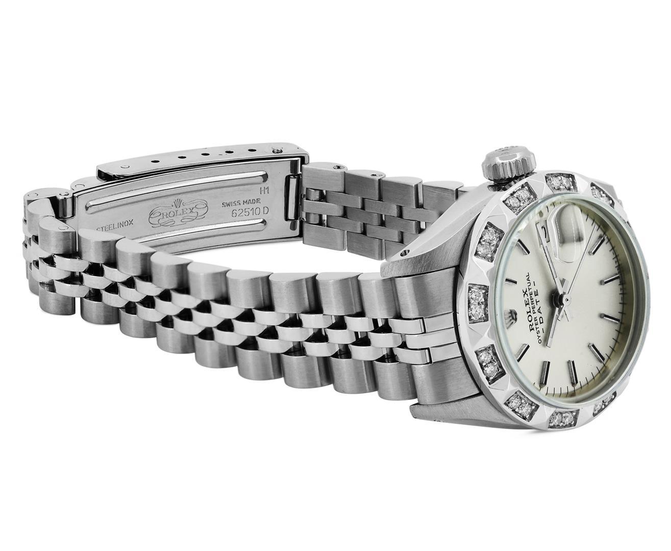 Rolex Ladies Stainless Steel Silver Index White Gold Pyramid Diamond Bezel Date
