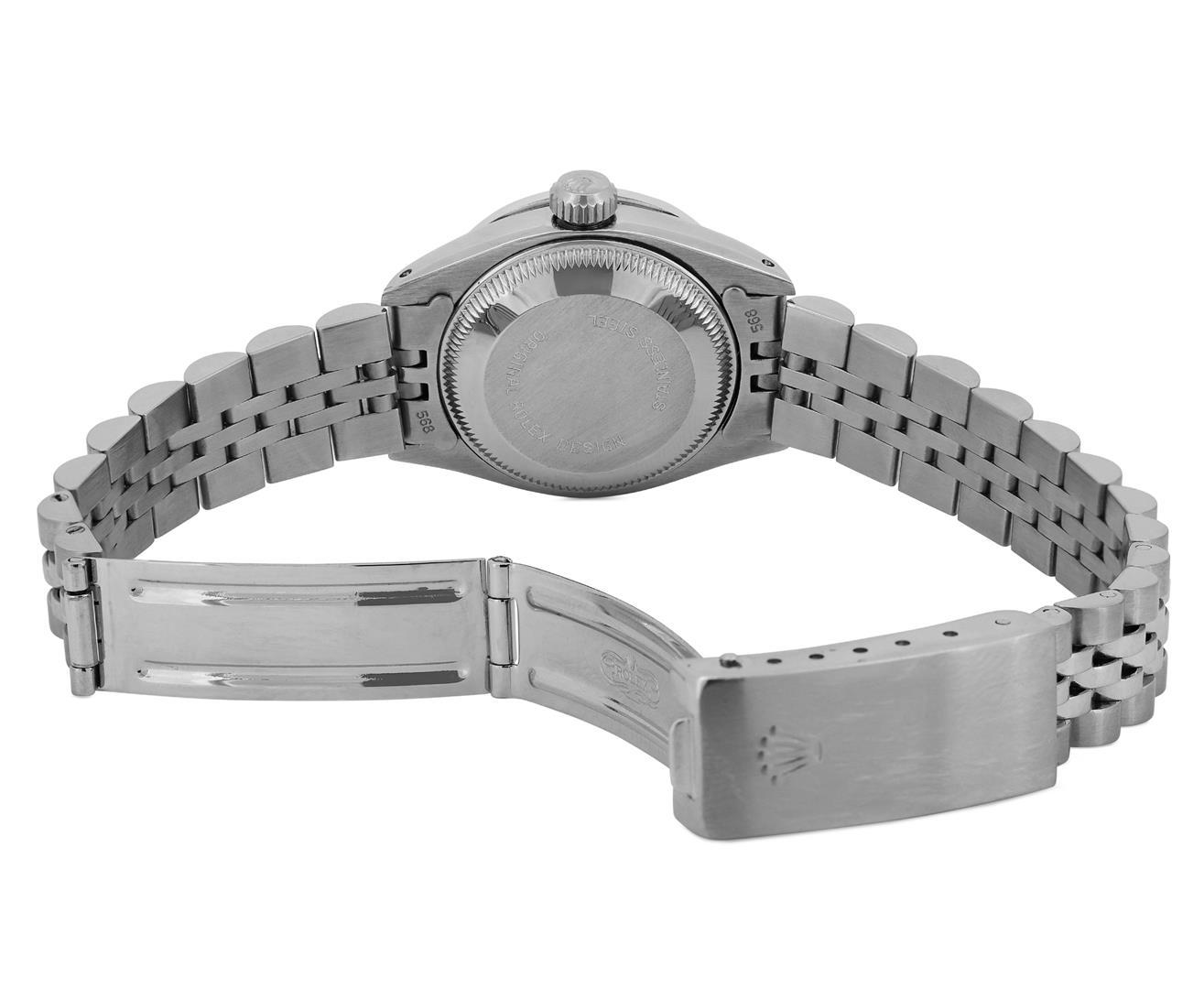 Rolex Ladies Stainless Steel Silver Index White Gold Pyramid Diamond Bezel Date