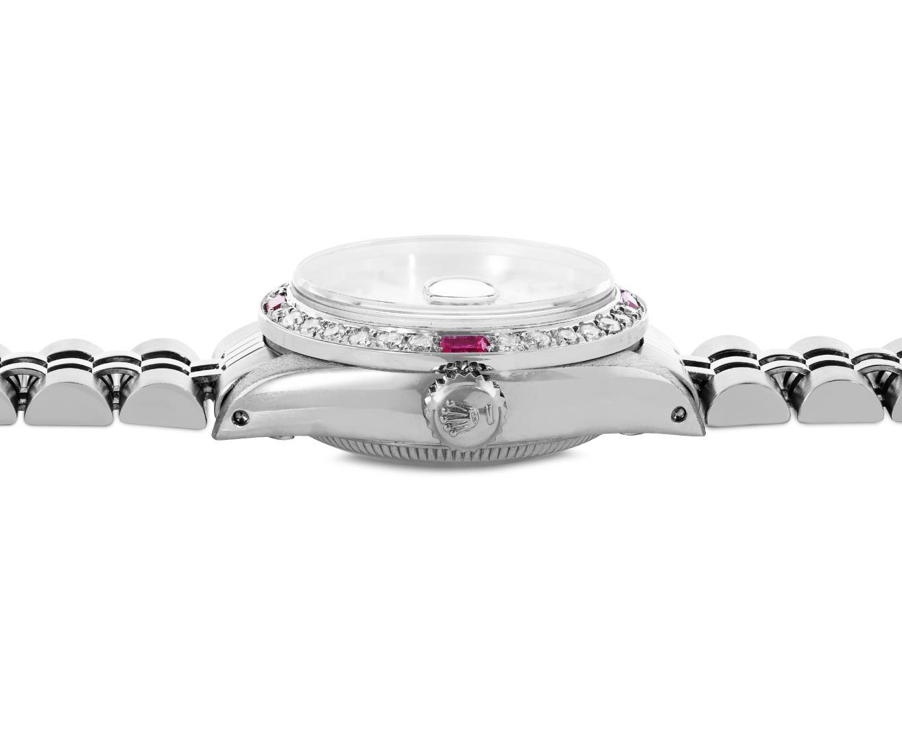 Rolex Ladies Stainless Steel 26MM Silver Index Dial Diamond And Ruby Bezel Date