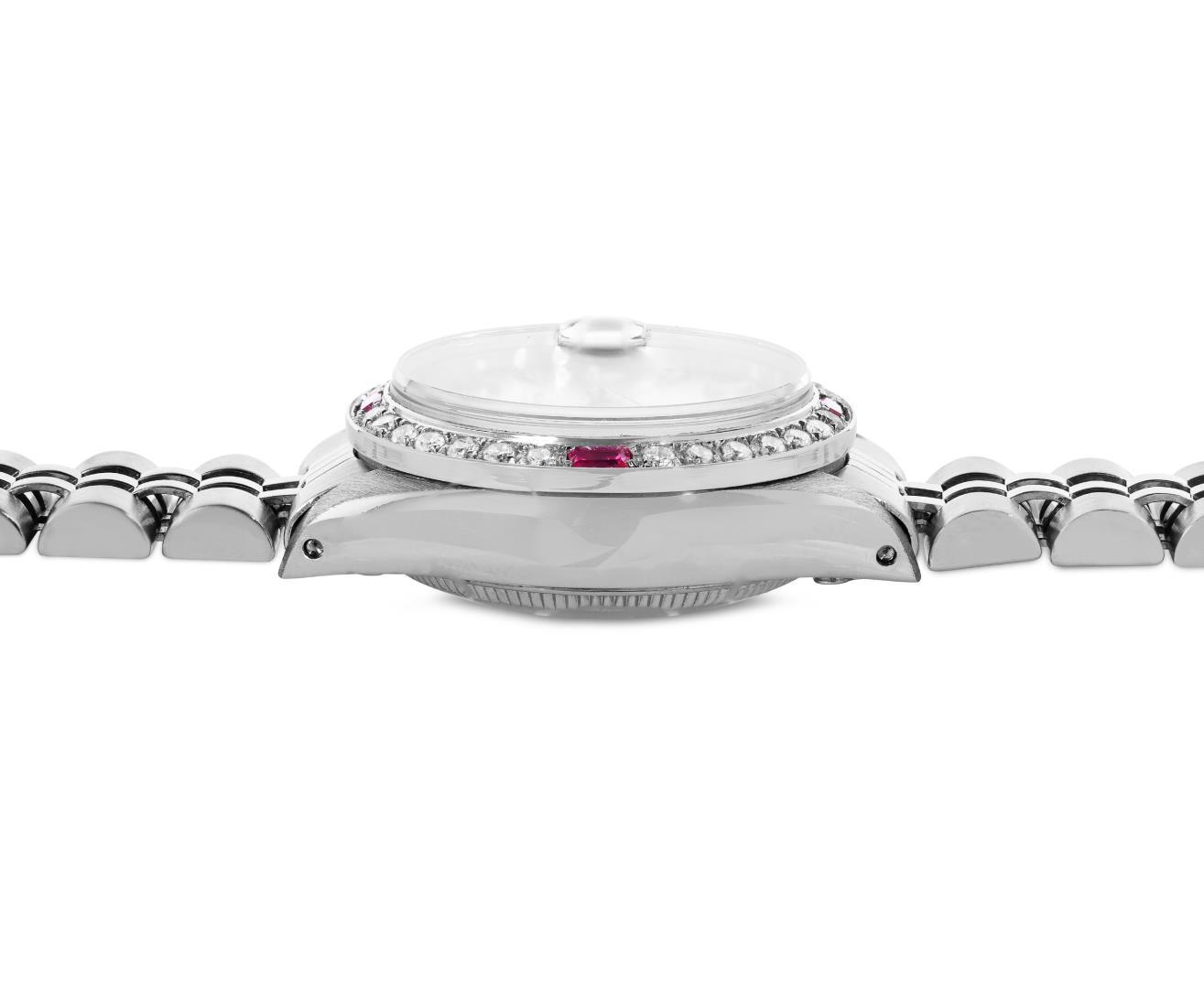 Rolex Ladies Stainless Steel 26MM Silver Index Dial Diamond And Ruby Bezel Date
