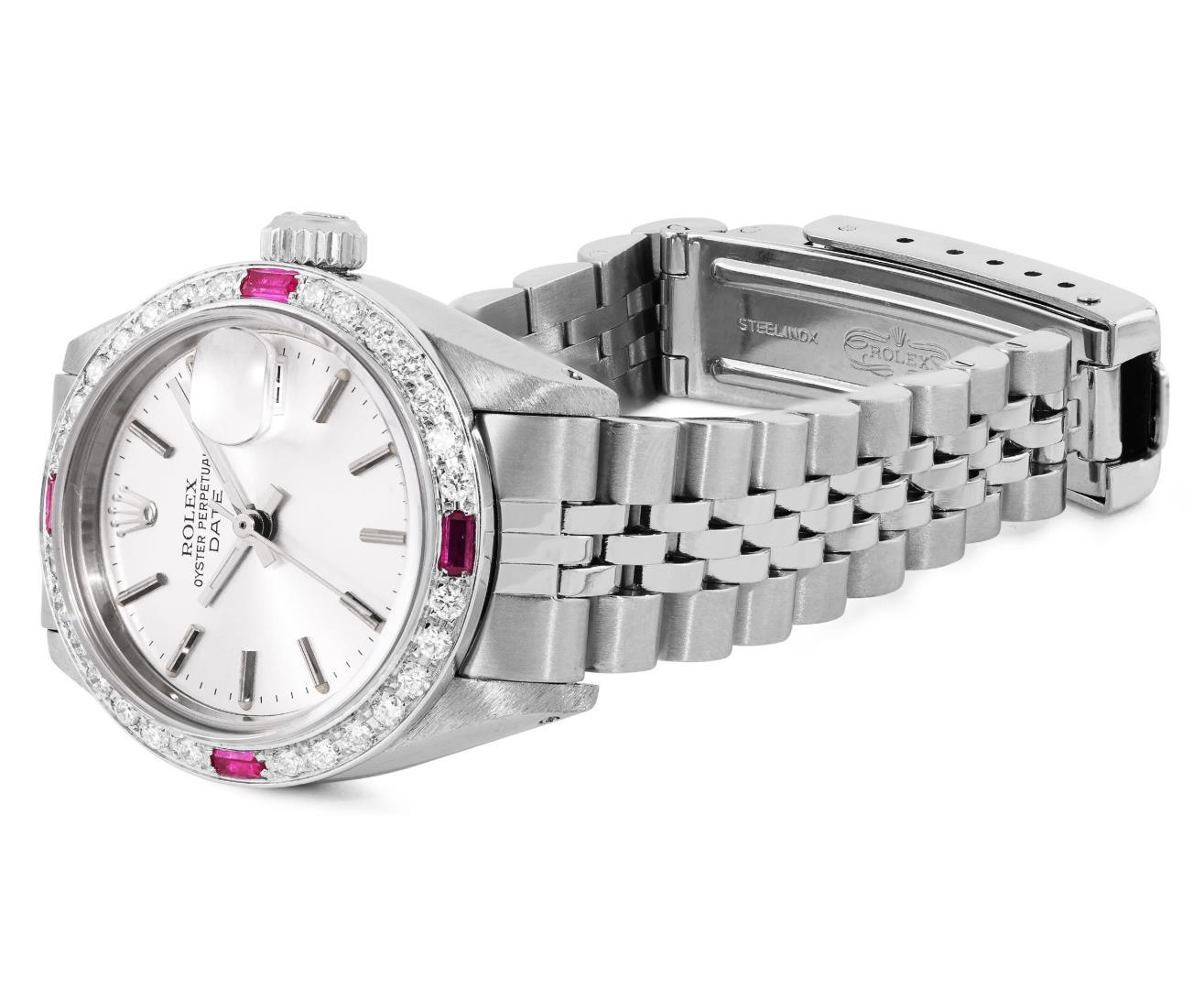Rolex Ladies Stainless Steel 26MM Silver Index Dial Diamond And Ruby Bezel Date
