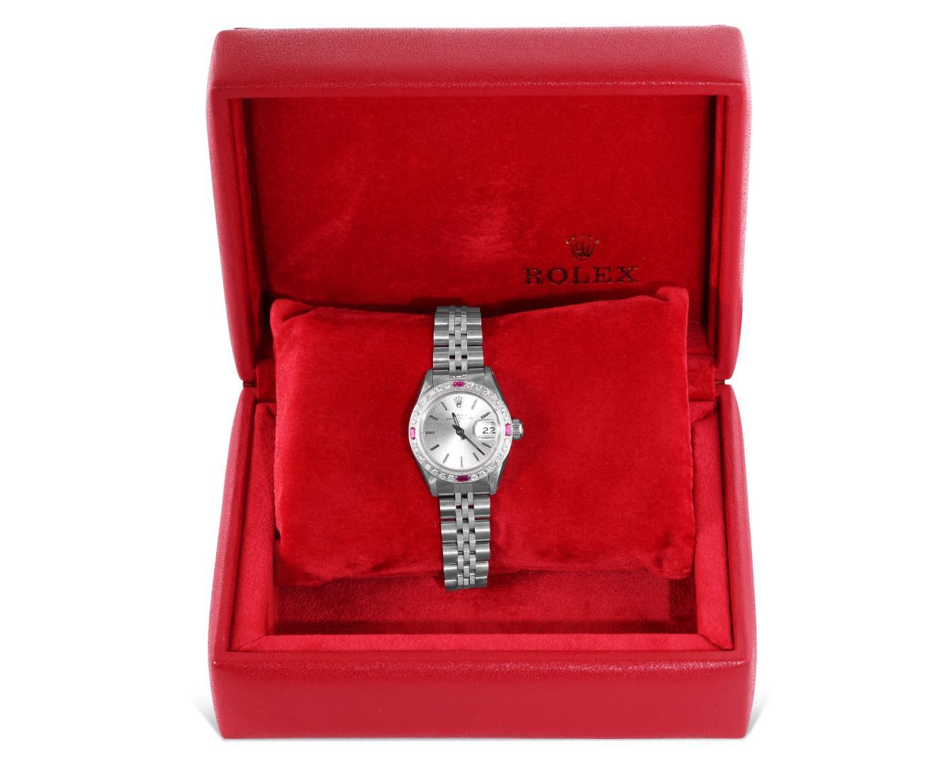 Rolex Ladies Stainless Steel 26MM Silver Index Dial Diamond And Ruby Bezel Date