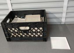 Crate full of dinner plates