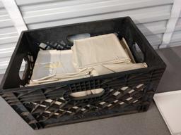 Crate full of dinner plates