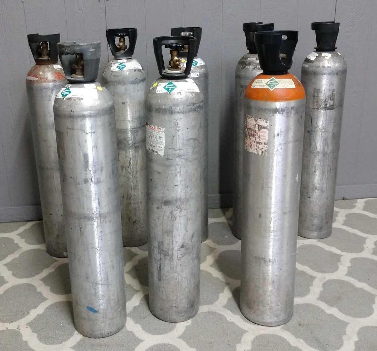8 carbon dioxide and helium tanks