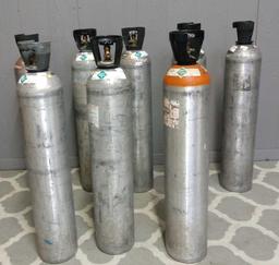8 carbon dioxide and helium tanks