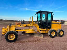 2010 Noram 65E motor grader, cab w/AC, 4 wheel drive, Cat diesel engine, 15-19.5 tires, powershift