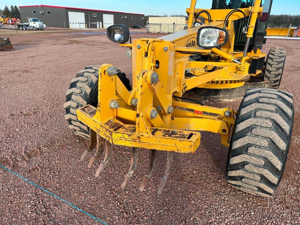 2010 Noram 65E motor grader, cab w/AC, 4 wheel drive, Cat diesel engine, 15-19.5 tires, powershift