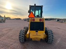 2010 Noram 65E motor grader, cab w/AC, 4 wheel drive, Cat diesel engine, 15-19.5 tires, powershift