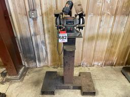 Delta double end grinder on stand.