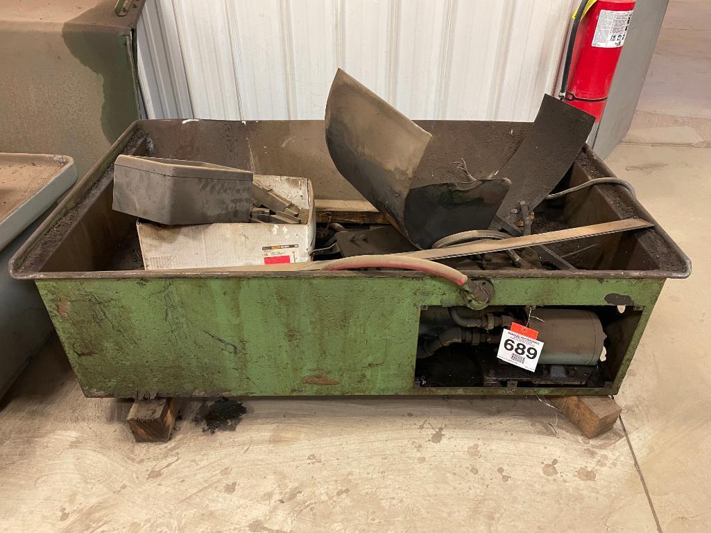 Chip bin w/ coolant pump; condition unknown.