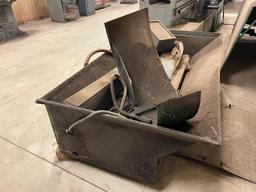Chip bin w/ coolant pump; condition unknown.