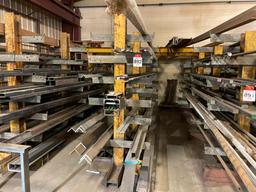 Assorted steel stock; angle, flat, bar, all in random lengths.