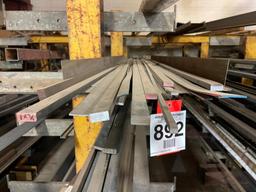 Assorted steel stock; angle, flat, bar, all in random lengths.