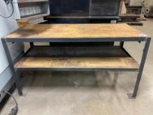 30-1/2 in x 68 in steel frame wood top work bench.