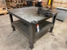 4 ft x 4 ft x 1 in steel welding table; 6 inch machinist vise.
