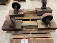 4 - Heavy duty steel casters.