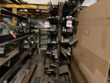 Assorted steel stock; flat, bar, square, round, all in random lengths.