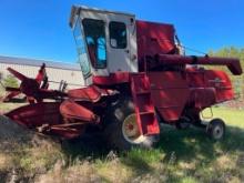 IHC 403 combine; cab; 13 ft grain head; flat drive tire; no engine; s/n 16279.