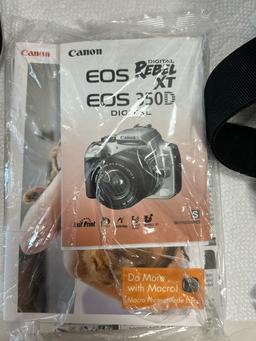 Canon DIGITAL EOS REBEL EOS 350D DIGITAL camera and tripod