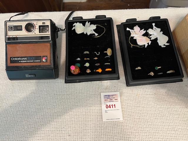 rings jewelry and Polaroid camera