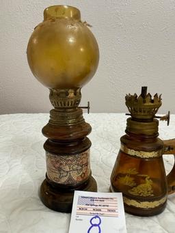 4 small oil lamps