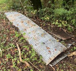 numerous pieces of old tin