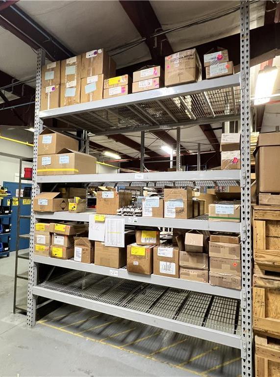 LOT RACK 12: BARRELS, UPPER RECEIVERS,  PARTS, PIC BLOCKS. $87,659 AT COST