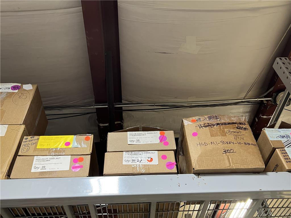 LOT RACK 12: BARRELS, UPPER RECEIVERS,  PARTS, PIC BLOCKS. $87,659 AT COST