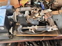 LOT OF 6-KEY MACHINES & CONTENTS ON AND UNDER BENCH, SKELTON KEY BOARD, CONTENTS ON SHELVING