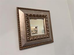 SET OF 3-GOLD FRAMED MIRRORS ON WALL