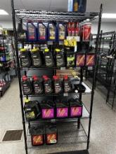 CONTENTS ON STORAGE RACK: ATV  MOTOR OILS, ACCELERATOR