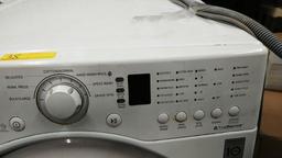 WHITE LG FRONT LOAD WASHER FOR PARTS OR REPAIR