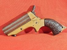 C. Sharps .22cal Model 1A Pepperbox 4-Shot Pistol