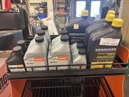 Stihl Rolling Display with Contents of Oil