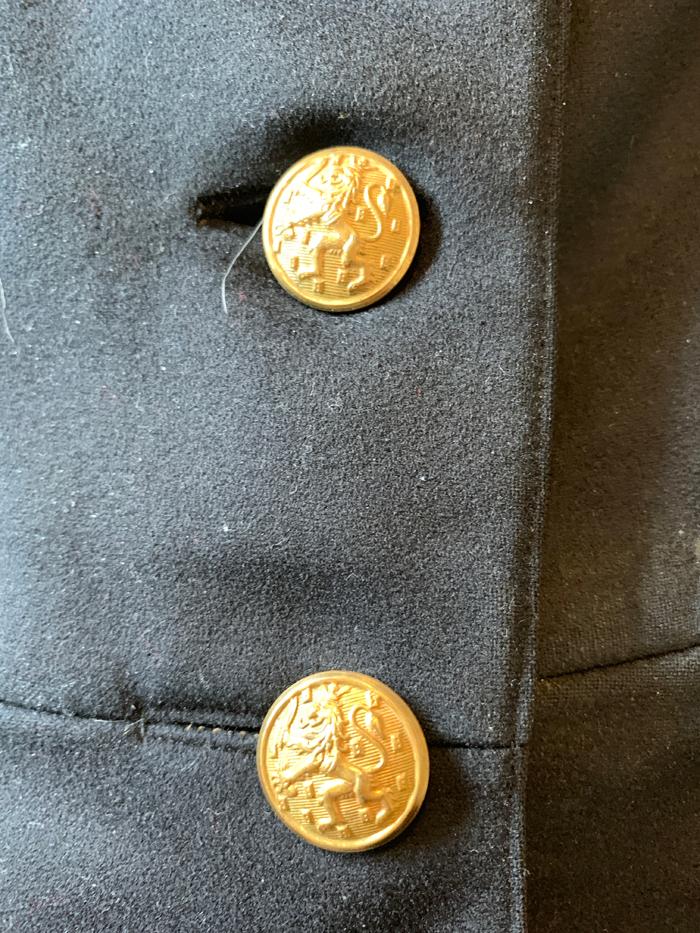 Blue double breasted frock coat with red cuffs and collars